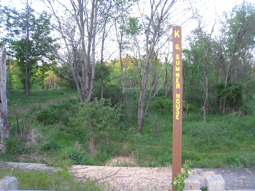 Old Hill Village - South End 450.jpg - In February 1937, residents of Hill Village NH learned that their village, near the Pemigewasset River, was to become a flood control reservoir for the Franklin Falls dam project. To accommodate the construction of the Franklin Falls Dam, the village of Hill NH was to be relocated. By January of 1940, the citizens of Hill NH formed an association, purchased land, and began planning a new model village with the help of the NH State Planning and Development Commission. Construction started in 1940, and by June of 1941 the new town hall and school were completed, along with the streets, water system, and 30 houses. The 1941 town meeting was called to order in the old town hall, recessed, and reconvened in the new village.